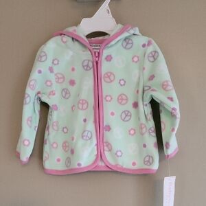 NWT very soft fleece zip up hoodie with peace sign/flower print